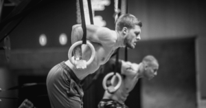 crossfit guy ring muscle up technique