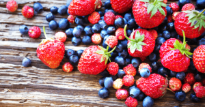 superfood berries blueberry strawberry on wood