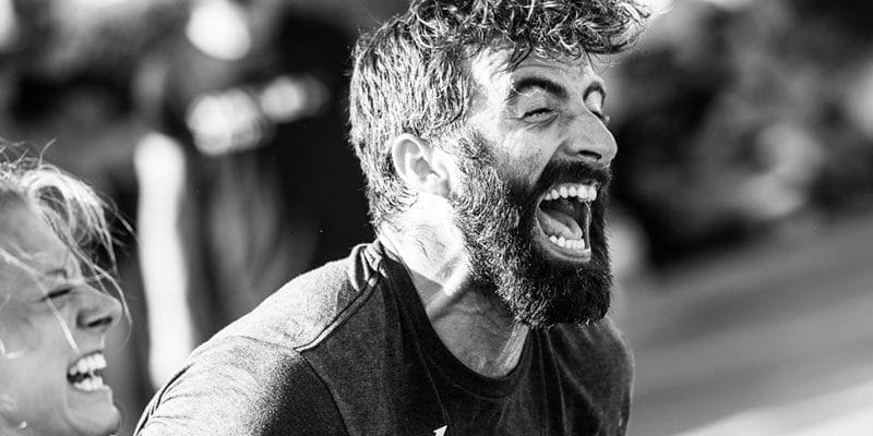 hammer crossfit athlete shouting during cable back exercises