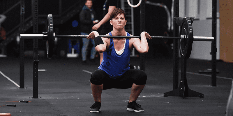 athlete perfects her weightlifting skills with clean workouts Beginner Ab Exercises