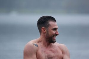 Man wild swimming