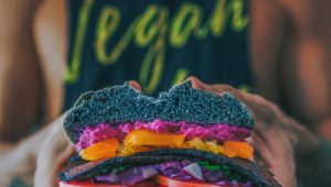 vegan sandwich held by fit person vegan bodybuilding