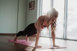 woman holds plank in unusual way