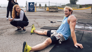 pat vellner breathing hard on the floor after workout