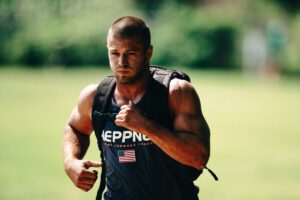 strong athlete does cardio Training Less