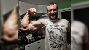 devon larratt shows off bicep