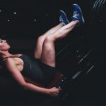 Woman does leg press at the gym