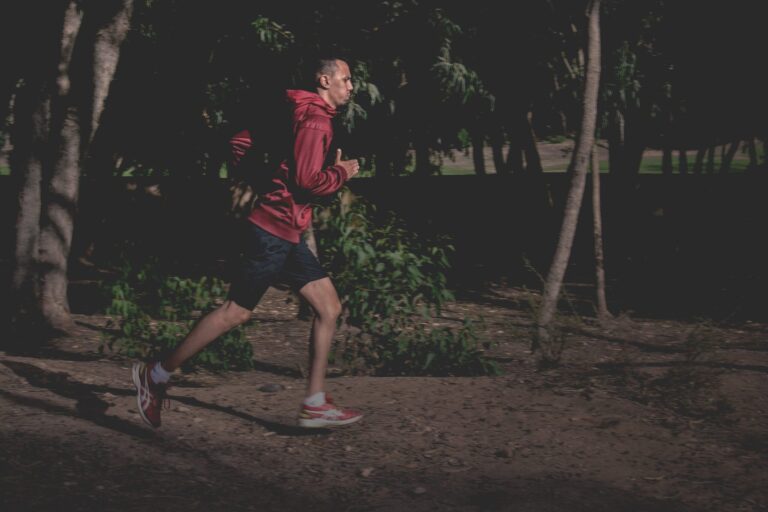 man runs in the dark