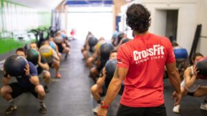 crossfit coach leads lesson