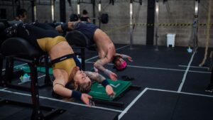 athletes perform ghd sit-ups at crossfit team quarterfinals Benefits of GHD Sit Ups