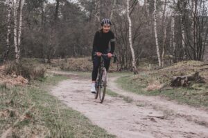 athlete cycles to recover from a workout