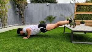 Man doing push up outside