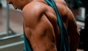 arms in the gym jacked man