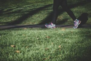 Woman walking on the grass